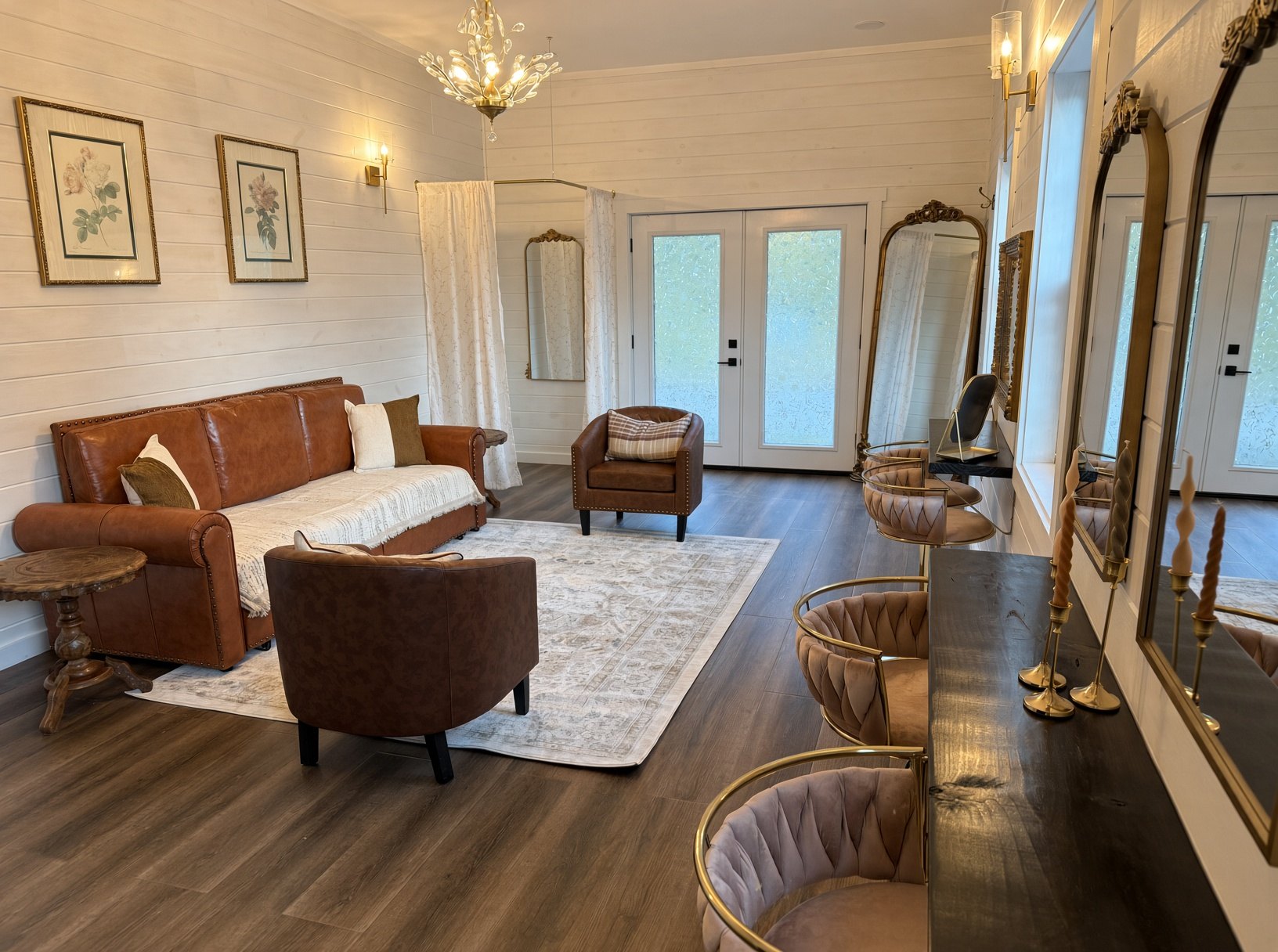 Bridal suite with leather seating, mirrors, and a long getting-ready counter